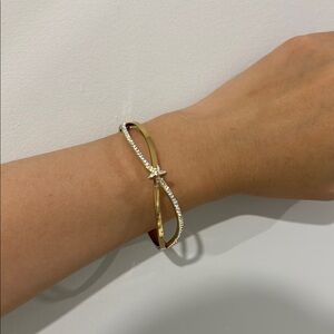 Elegant Gold and Silver Infinity Bracelet